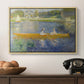The Skiff (La Yole), 1875 by Pierre-Auguste Renoir in a natural wood floater framed canvas displayed above a console table in a hallway, featuring a leisure scene of figures in a small rowboat on tranquil water.