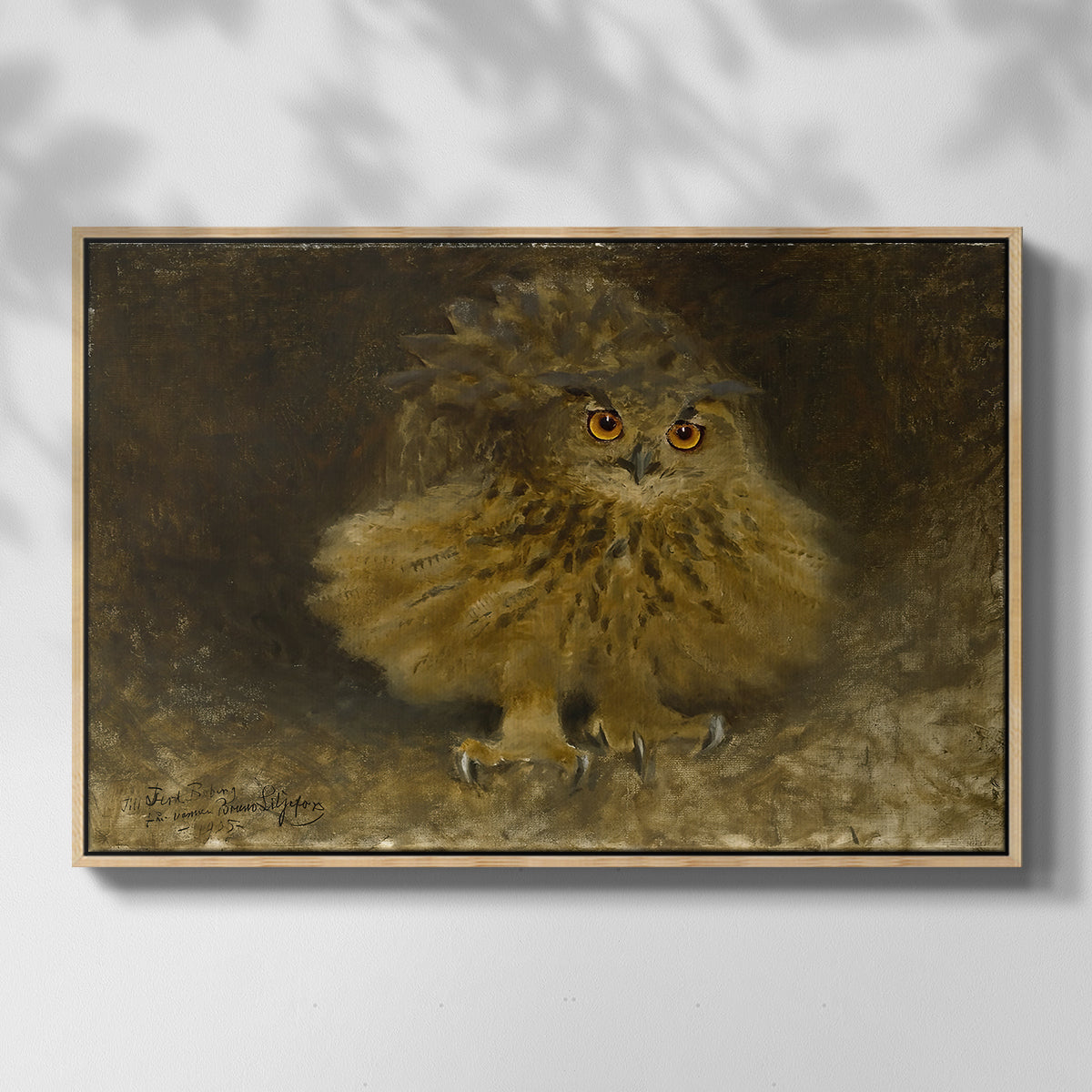 Front view of An Eagle Owl (Berguv), 1905 by Bruno Liljefors in a natural wood floater framed canvas.