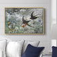 Common Swifts, 1886 by Bruno Liljefors displayed above a sofa in a living room in a natural wood floater frame, featuring swifts gliding midair with wings spread against soft sky.