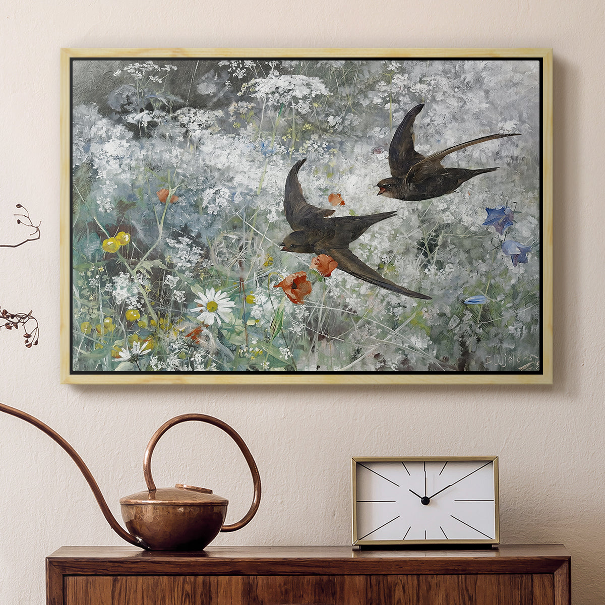 Natural wood floater framed canvas featuring a multiple birds flying together in natural outdoor scene, displayed above a cabinet in a soft-toned living room.