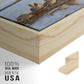 Close-up of the natural wood floater frame corner and gallery wrapped canvas construction.