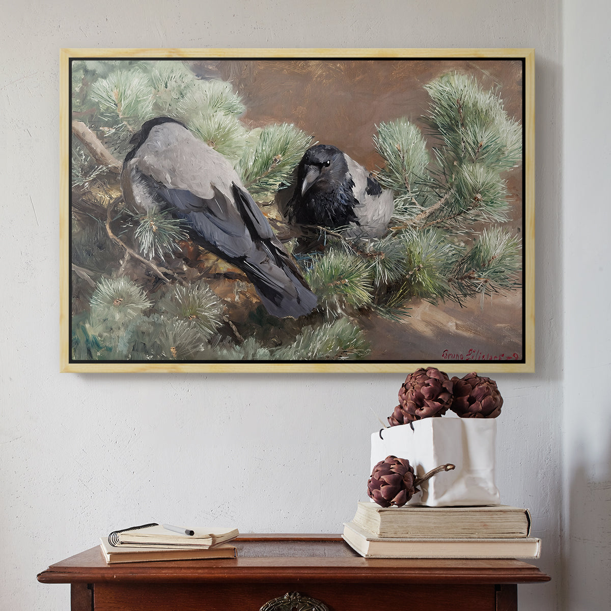 Natural wood floater framed canvas featuring Hooded Crows (Kråkor), 1891 by Bruno Liljefors above an entryway table in a minimalist foyer.
