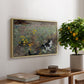 Cat on a Flowery Meadow, 1887 by Bruno Liljefors, presented in a natural wood floater framed canvas featuring a cat crouching in a meadow filled with wildflowers and greenery, displayed above a hallway console table.