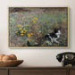 Cat on a Flowery Meadow, 1887 by Bruno Liljefors in a natural wood floater framed canvas displayed above a console table in a hallway, featuring a naturalistic depiction of cat in blooming countryside setting.