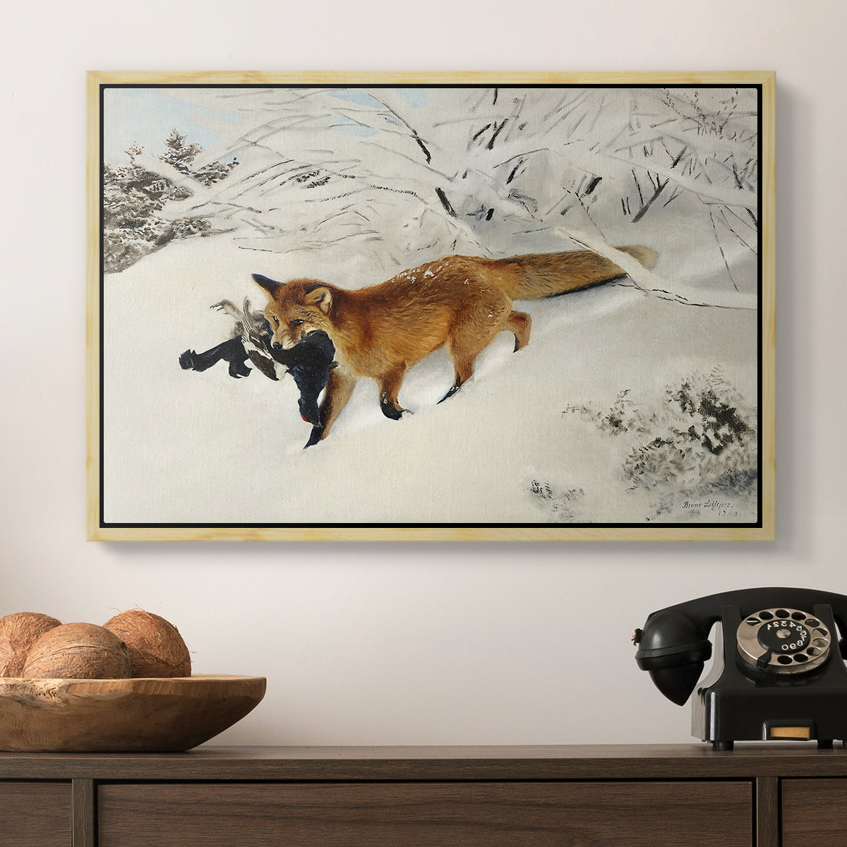 Fox in Snow Landscape, 1900 by Bruno Liljefors in a natural wood floater framed canvas displayed above a console table in a hallway, featuring a dynamic depiction of animal in cold snowy environment.