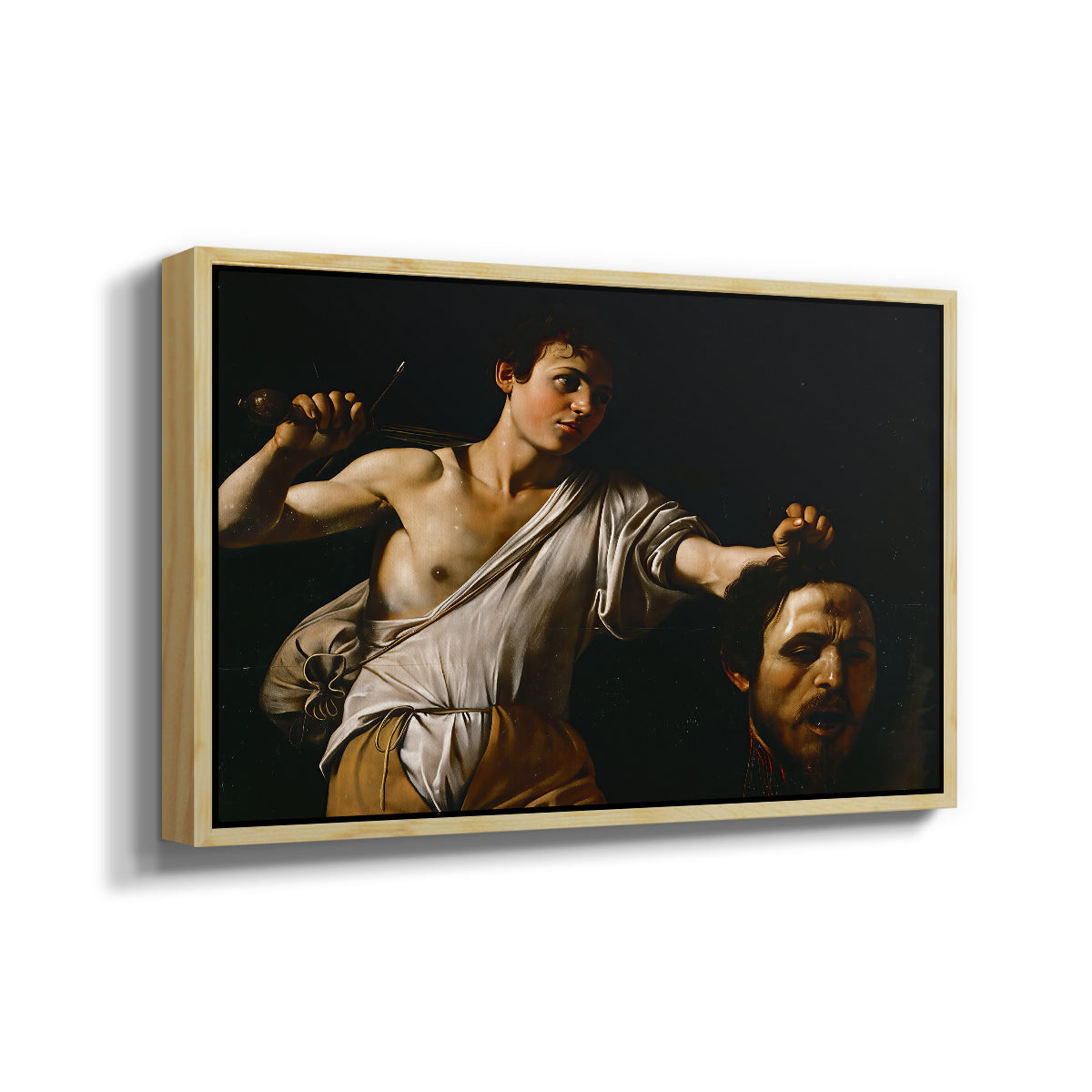 Angled view of David with the Head of Goliath (Vienna Version), c. 1607 by Caravaggio in a natural wood floater framed canvas.