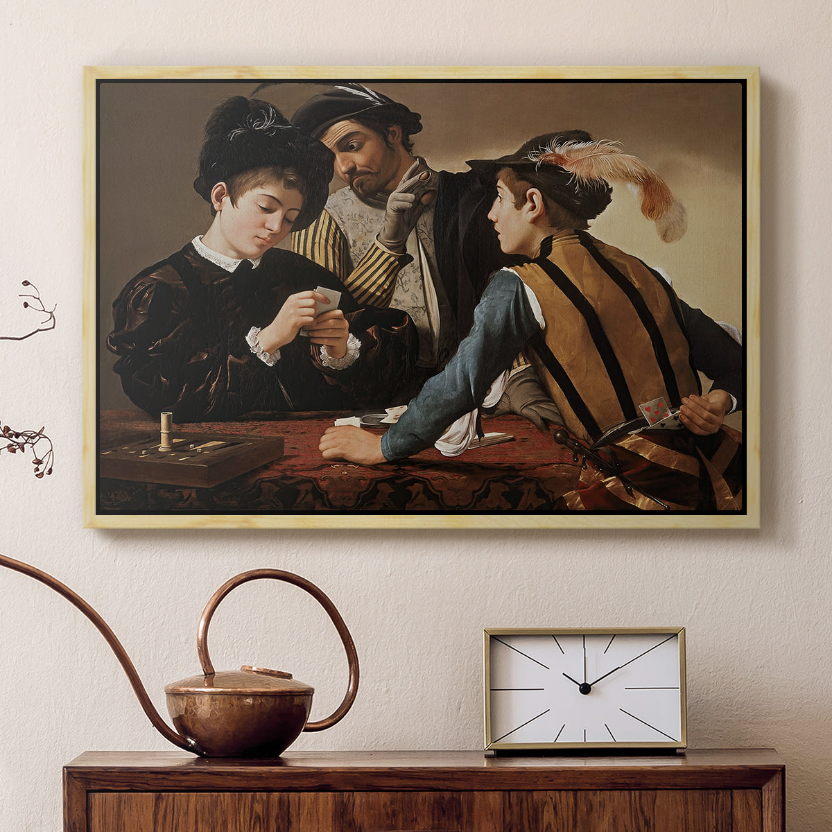 Natural wood floater framed canvas featuring a young men playing cards with one cheating and another watching closely, displayed above a cabinet in a soft-toned living room.
