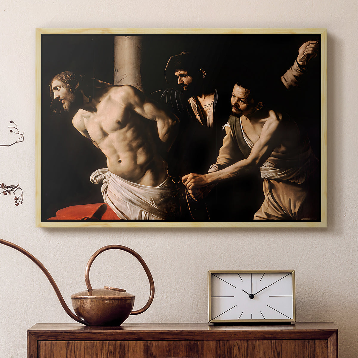 Natural wood floater framed canvas featuring a biblical depiction of men whipping Christ tied to pillar, displayed above a cabinet in a soft-toned living room.