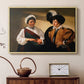 Natural wood floater framed canvas featuring an intimate scene of palm reading with subtle act of theft, displayed above a cabinet in a soft-toned living room.