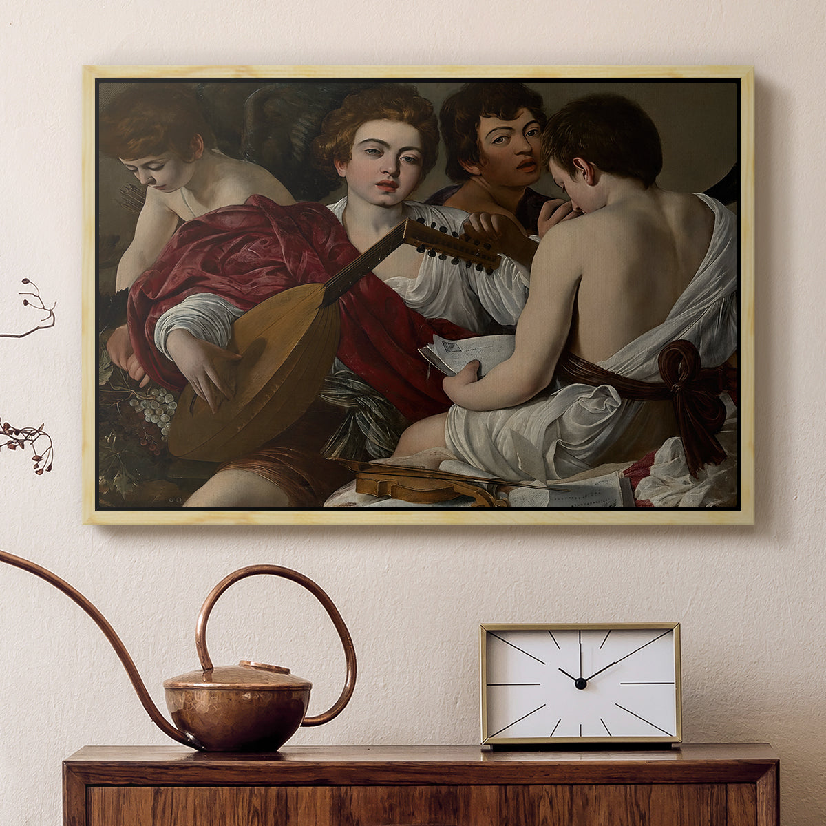 Natural wood floater framed canvas featuring an intimate scene of youths making music with sheet music and instruments, displayed above a cabinet in a soft-toned living room.
