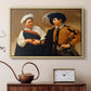 Natural wood floater framed canvas featuring a close interaction between two figures involving deception and gesture, displayed above a cabinet in a soft-toned living room.