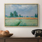 The Wheat Field (Champ de Blé), 1881 by Claude Monet in a natural wood floater framed canvas displayed above a console table in a hallway, featuring a serene rural scene with textured wheat under natural light.