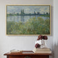 Natural wood floater framed canvas featuring Banks of the Seine, Vétheuil, 1880 by Claude Monet above an entryway table in a minimalist foyer.