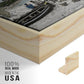 Close-up of the natural wood floater frame corner and gallery wrapped canvas construction.