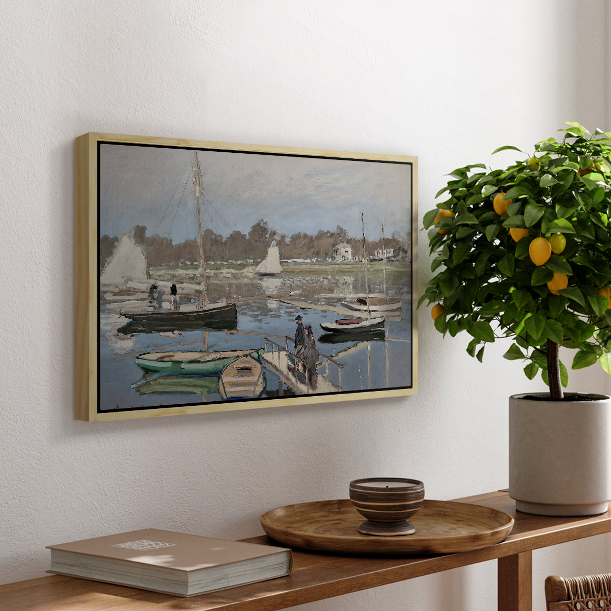 The Basin at Argenteuil, 1874 by Claude Monet, presented in a natural wood floater framed canvas featuring sailboats gathered in calm basin with reflections on water, displayed above a hallway console table.