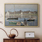 Natural wood floater framed canvas featuring a harbor basin filled with boats under soft sky, displayed above a cabinet in a soft-toned living room.