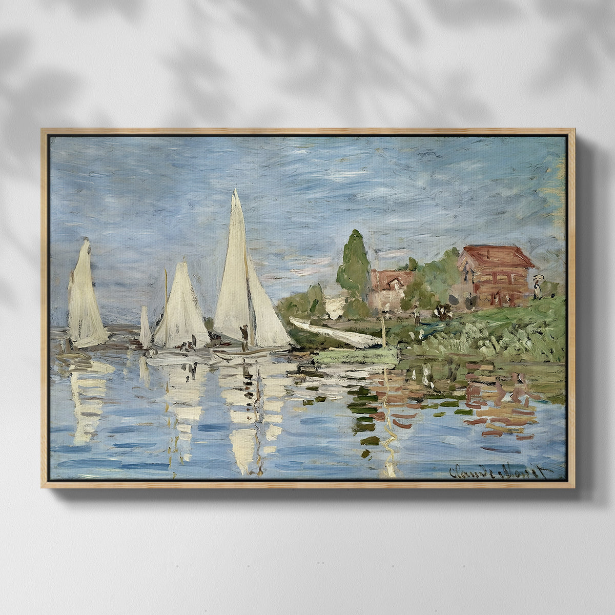 Front view of Regatta at Argenteuil, 1872 by Claude Monet in a natural wood floater framed canvas.