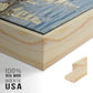 Close-up of the natural wood floater frame corner and gallery wrapped canvas construction.