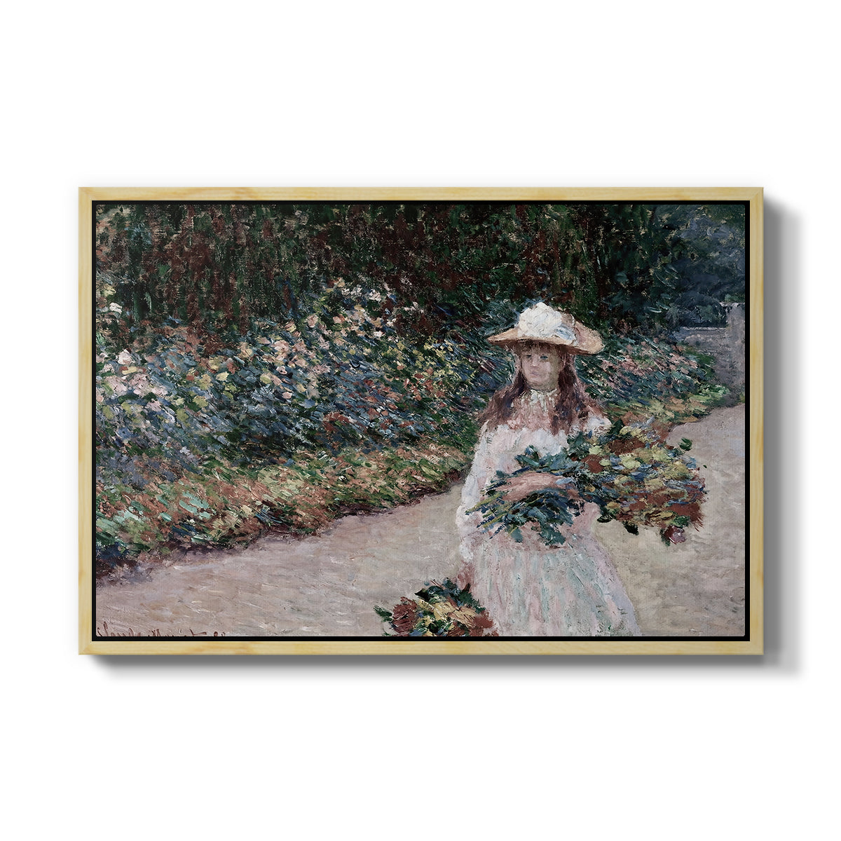 Young Girl in the Garden at Giverny, 1888 by Claude Monet in a natural wood floater framed canvas wall art display.