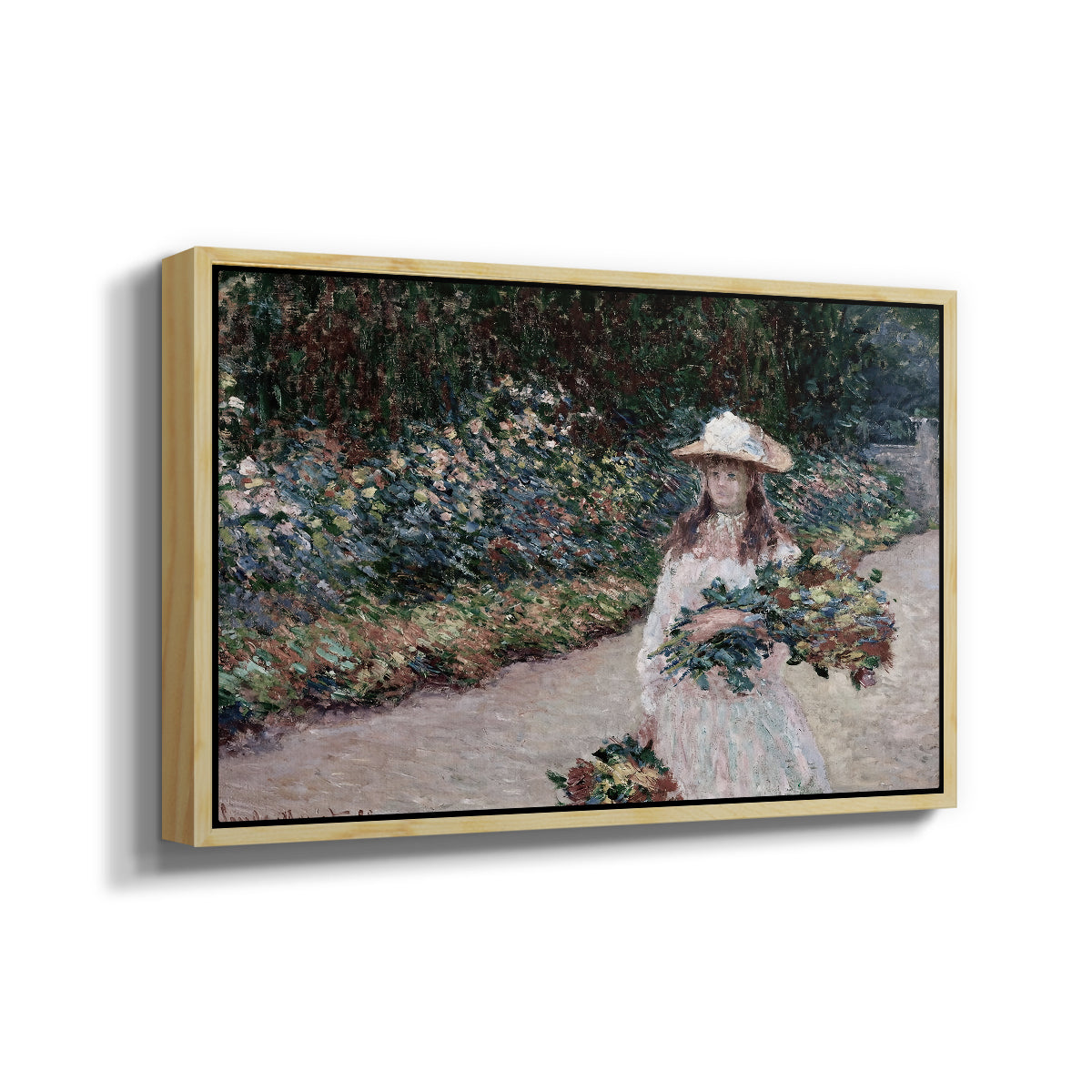 Angled view of Young Girl in the Garden at Giverny, 1888 by Claude Monet in a natural wood floater framed canvas.