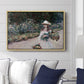 Young Girl in the Garden at Giverny, 1888 by Claude Monet displayed above a sofa in a living room in a natural wood floater frame, featuring an impressionist garden scene with child among greenery and blossoms.
