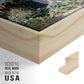 Close-up of the natural wood floater frame corner and gallery wrapped canvas construction.
