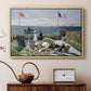Natural wood floater framed canvas featuring a vibrant garden scene with colorful blooms and distant sea, displayed above a cabinet in a soft-toned living room.