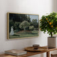 Woman in the Garden, Sainte-Adresse, 1867 by Claude Monet, presented in a natural wood floater framed canvas featuring a woman standing in garden surrounded by flowers and greenery, displayed above a hallway console table.