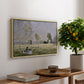 Summer (L'ete), 1874 by Claude Monet, presented in a natural wood floater framed canvas featuring a woman seated in grassy field beneath tree in bright summer landscape, displayed above a hallway console table.
