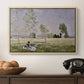 Summer (L'ete), 1874 by Claude Monet in a natural wood floater framed canvas displayed above a console table in a hallway, featuring a tranquil summer landscape with lone figure in nature.
