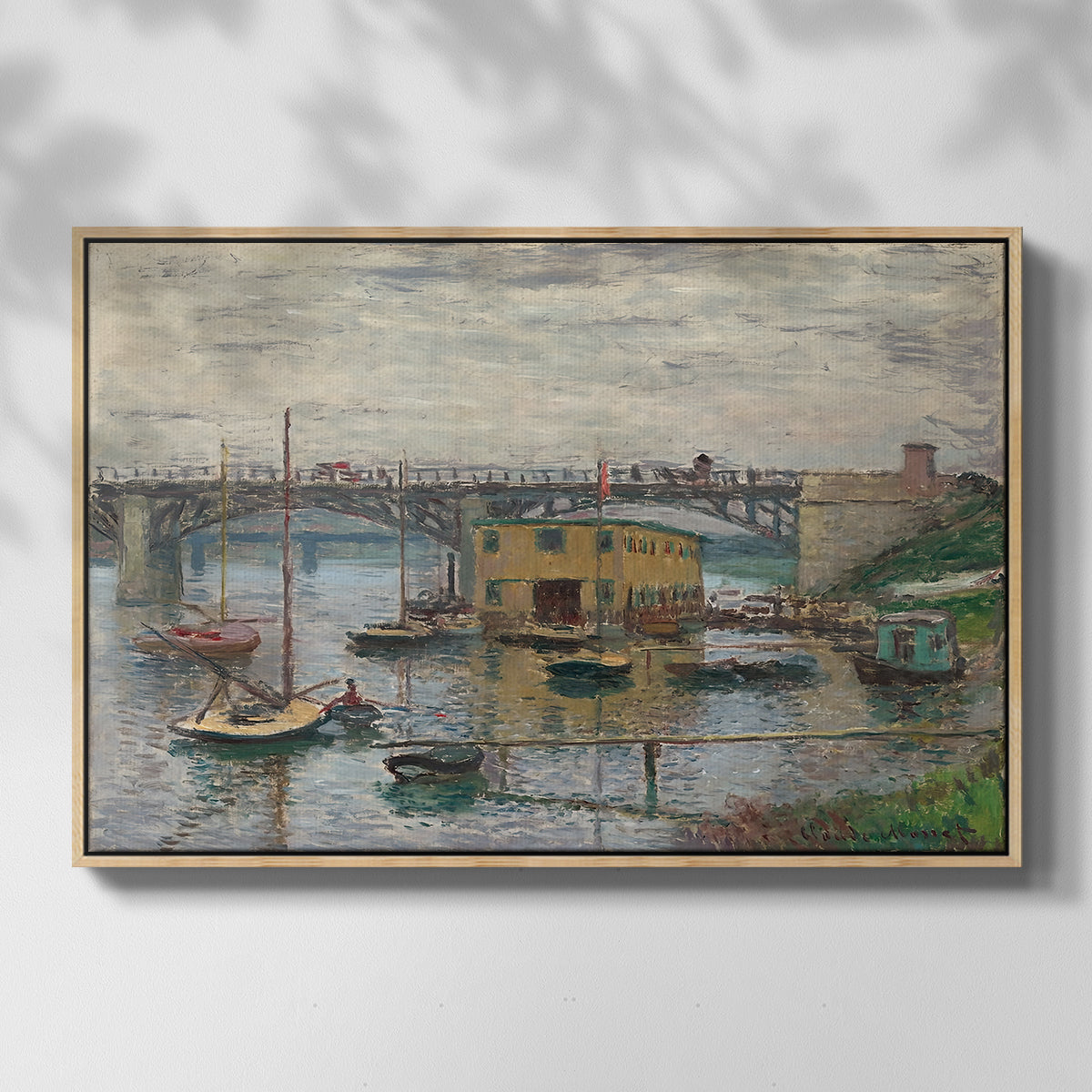 Front view of Bridge at Argenteuil on a Gray Day, c. 1876 by Claude Monet in a natural wood floater framed canvas.