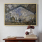 Natural wood floater framed canvas featuring The Gare Saint-Lazare, 1877 by Claude Monet above an entryway table in a minimalist foyer.