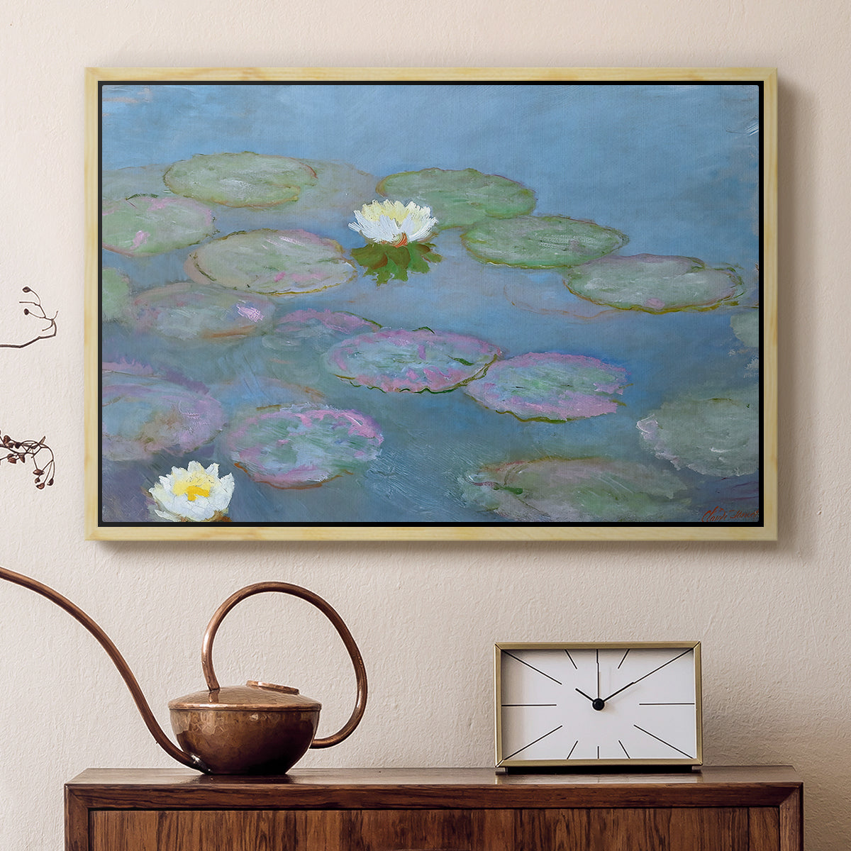 Natural wood floater framed canvas featuring a tranquil water surface covered with blooming lilies, displayed above a cabinet in a soft-toned living room.