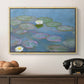 Water Lilies (Nymphéas), 1897-1899 by Claude Monet in a natural wood floater framed canvas displayed above a console table in a hallway, featuring a close-up of aquatic plants in still water.