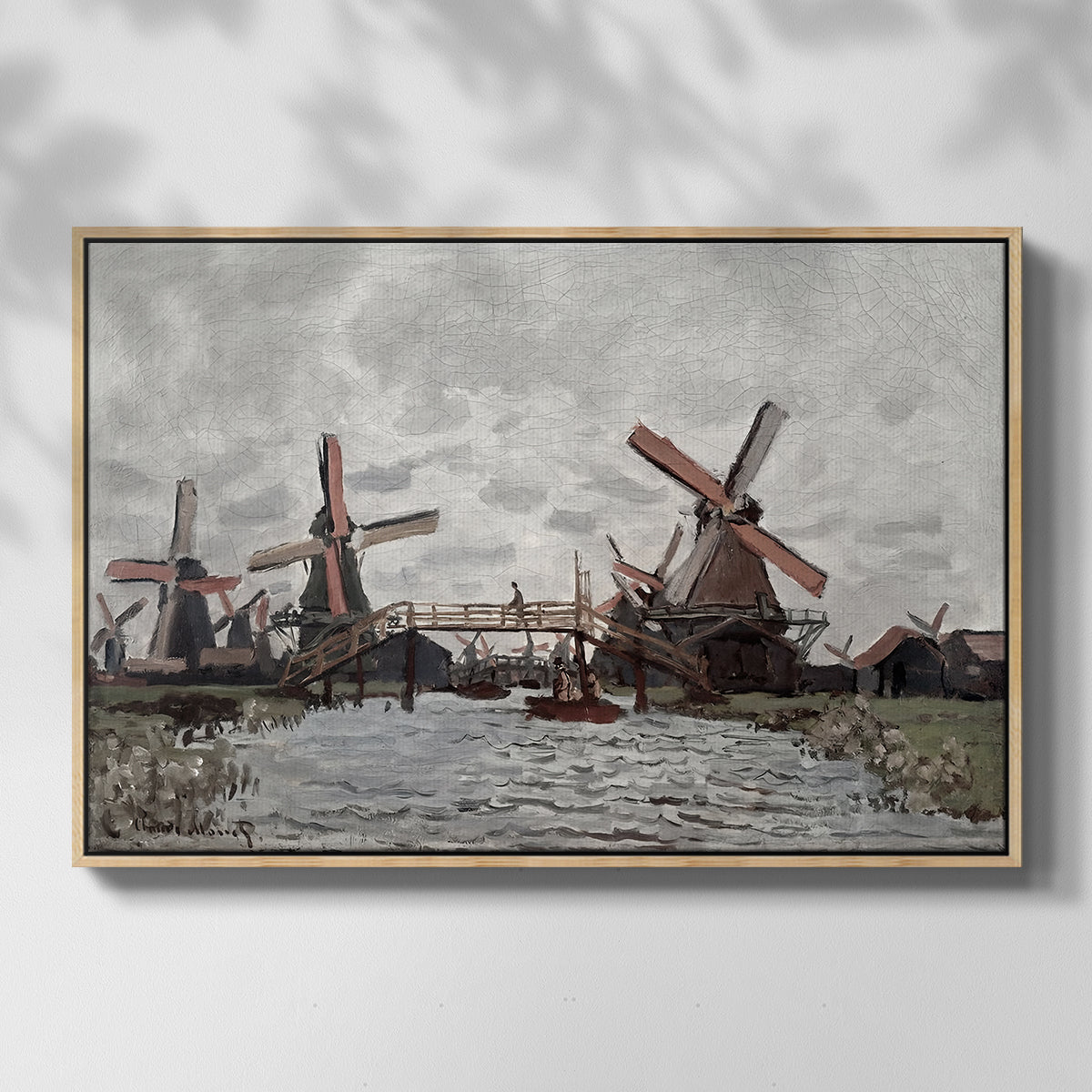 Front view of Windmills near Zaandam, 1871 by Claude Monet in a natural wood floater framed canvas.