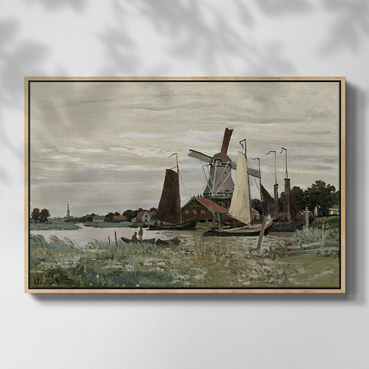 Front view of Windmill at Zaandam, 1871 by Claude Monet in a natural wood floater framed canvas.