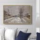 The Boulevard de Pontoise at Argenteuil, Snow Effect, 1875 by Claude Monet displayed above a sofa in a living room in a natural wood floater frame, featuring an impressionist winter scene with road and bare trees.