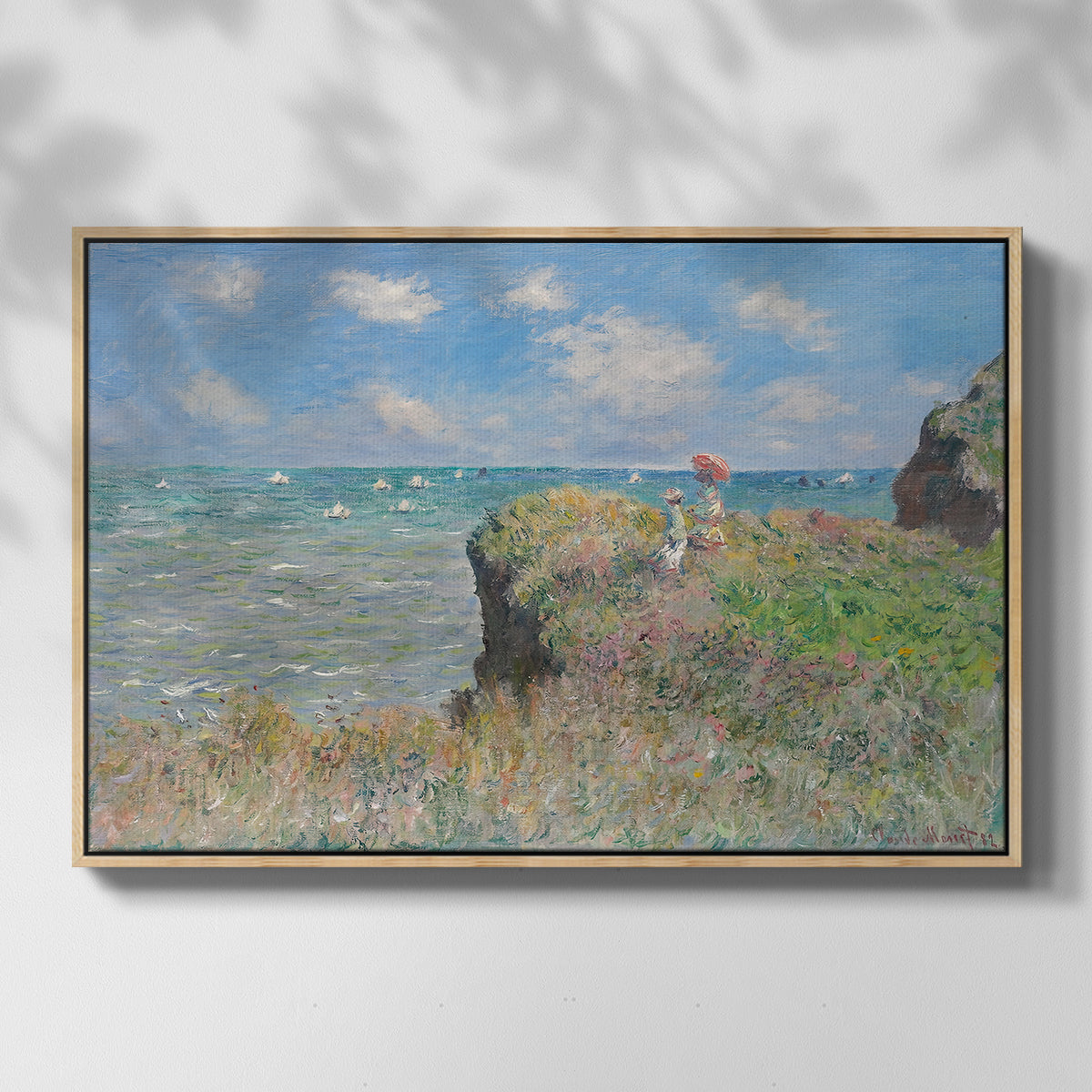 Front view of The Cliff Walk at Pourville, 1882 by Claude Monet in a natural wood floater framed canvas.