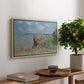 The Cliff Walk at Pourville, 1882 by Claude Monet, presented in a natural wood floater framed canvas featuring figures walking along coastal cliff path overlooking ocean and sky, displayed above a hallway console table.