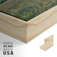 Close-up of the natural wood floater frame corner and gallery wrapped canvas construction.