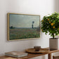 Poppy Field, 1881 by Claude Monet, presented in a natural wood floater framed canvas featuring a wide field of red poppies stretching across countryside under open sky, displayed above a hallway console table.