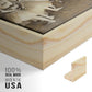 Close-up of the natural wood floater frame corner and gallery wrapped canvas construction.