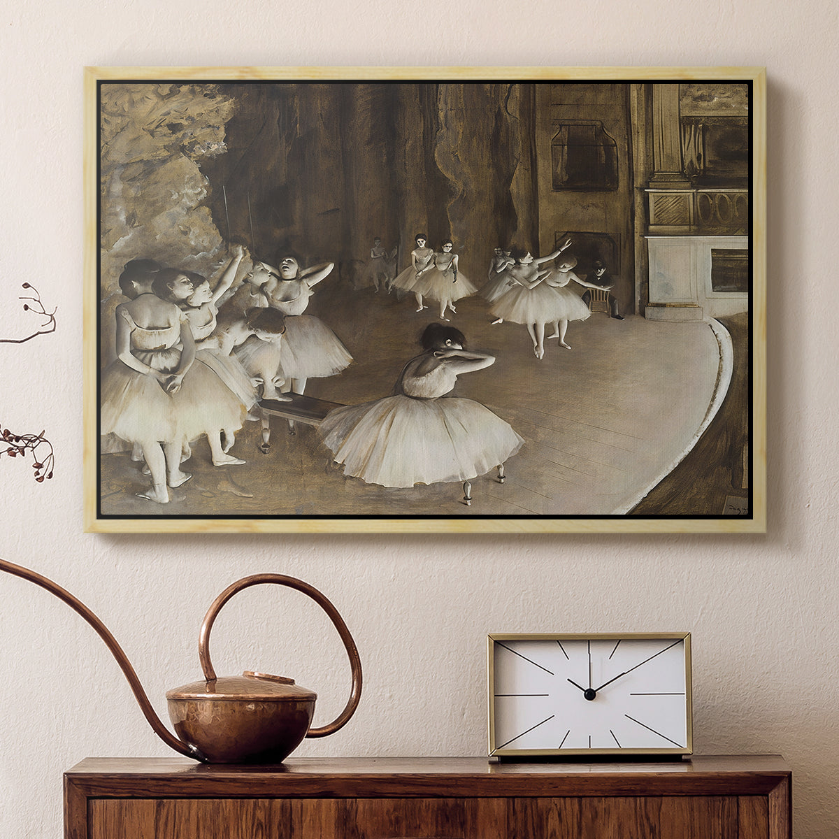 Natural wood floater framed canvas featuring an impressionist depiction of ballet practice on theater stage, displayed above a cabinet in a soft-toned living room.