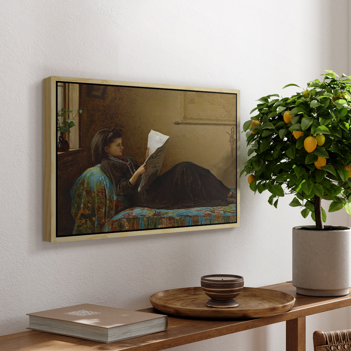 Interesting News, 1872 by Eastman Johnson, presented in a natural wood floater framed canvas featuring a group of people gathered indoors reading newspaper together, displayed above a hallway console table.