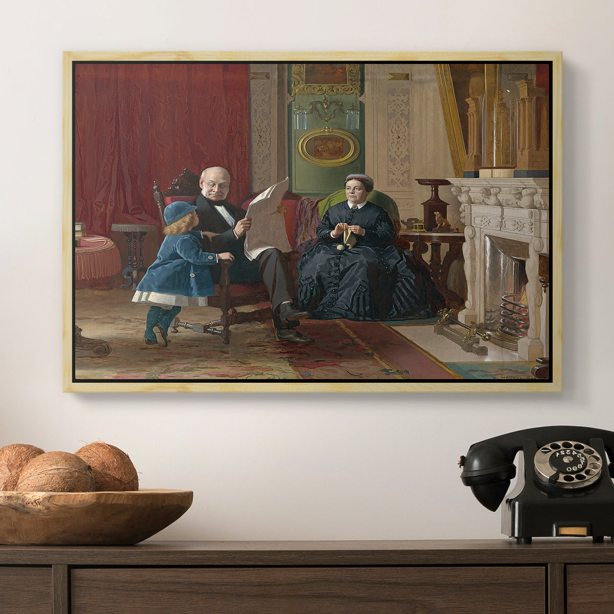 The Brown Family, 1869 by Eastman Johnson in a natural wood floater framed canvas displayed above a console table in a hallway, featuring a family group portrait with warm interior tones.