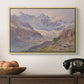 Odenwinklkees with the Johannisberg, 1902 by Edward Theodore Compton in a natural wood floater framed canvas displayed above a console table in a hallway, featuring an expansive alpine view with ice and distant mountains.