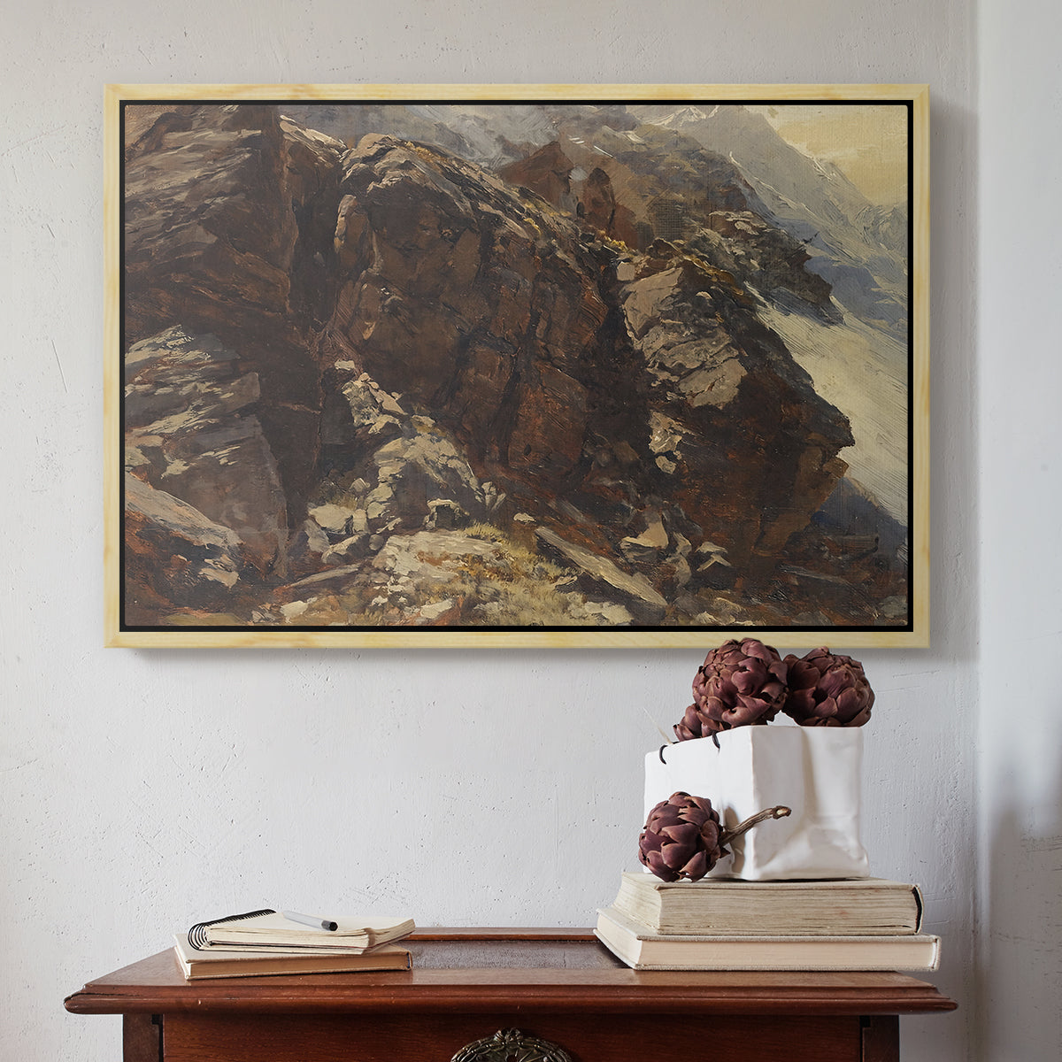 Natural wood floater framed canvas featuring High Mountain Study, c. 1870 by Edward Theodore Compton above an entryway table in a minimalist foyer.