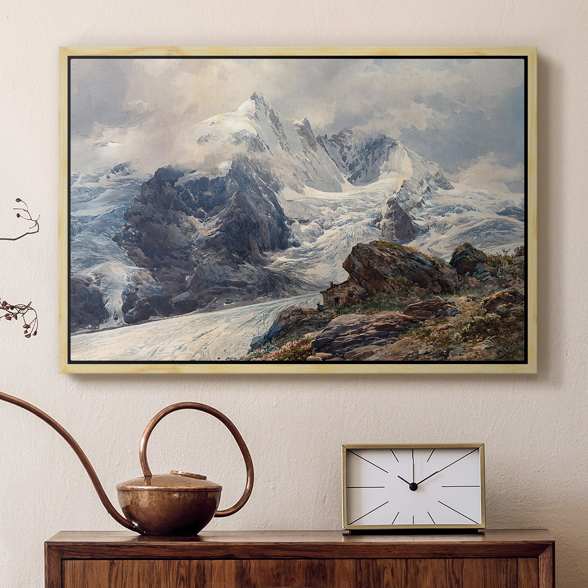Natural wood floater framed canvas featuring a realistic landscape of high mountain under open sky, displayed above a cabinet in a soft-toned living room.