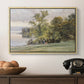 Landscape at Lake Starnberg, 1890 by Edward Theodore Compton in a natural wood floater framed canvas displayed above a console table in a hallway, featuring a tranquil lakeside view with soft atmospheric tones.
