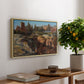 Palatine in Rome, c. 1921 by Edward Theodore Compton, presented in a natural wood floater framed canvas featuring historic Roman ruins and buildings set within warm landscape, displayed above a hallway console table.